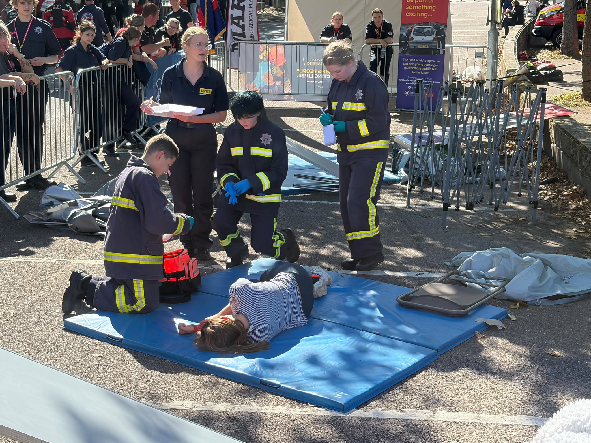 Cadets are assessed while carrying out a simulated casualty care exercise