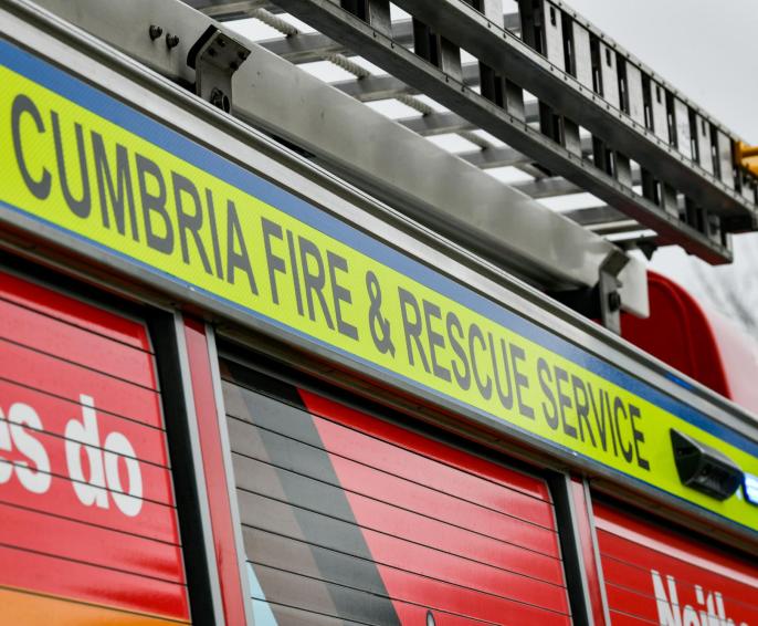 Cumbria Fire & Rescue Service text on the side of a fire engine