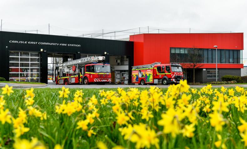 Carlisle East Fire Station with flower in the forefront