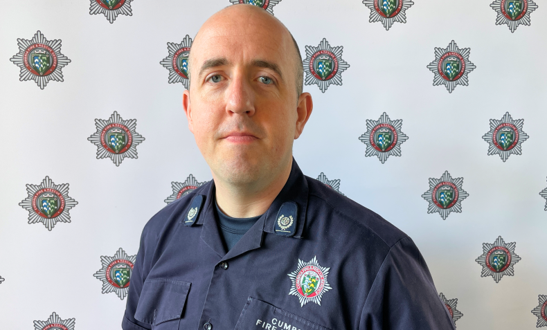 A portrait of a male firefighter