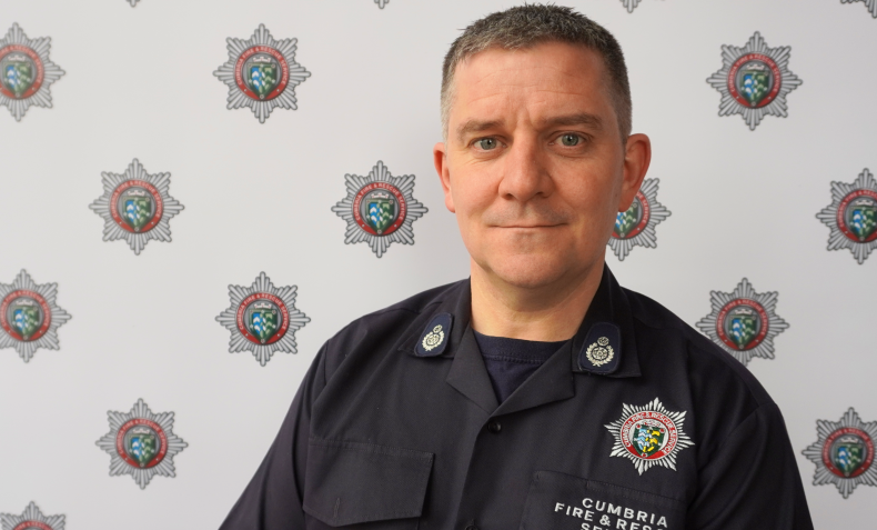 A portrait of a male firefighter