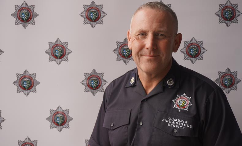 A portrait of a male firefighter
