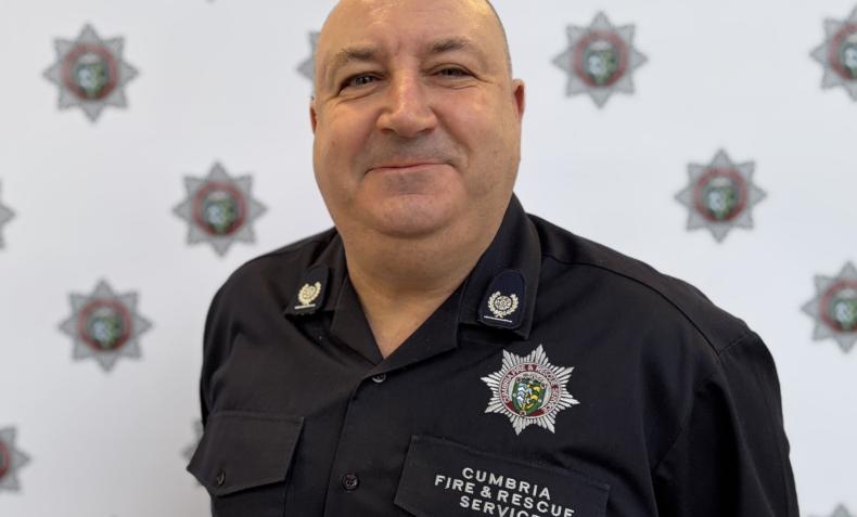 A portrait of a male firefighter