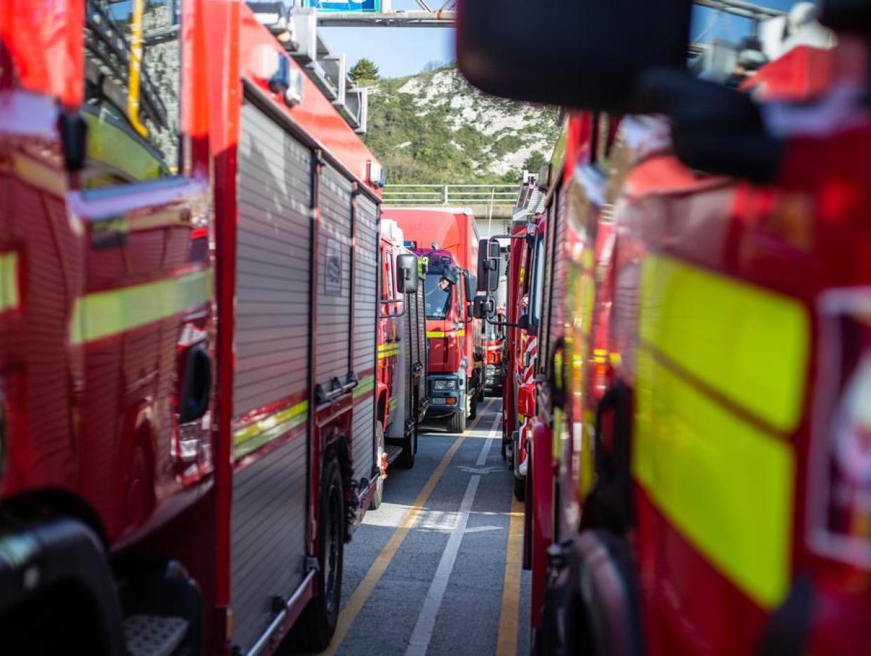 Fire and rescue service vehicles parked up in convoy - close up