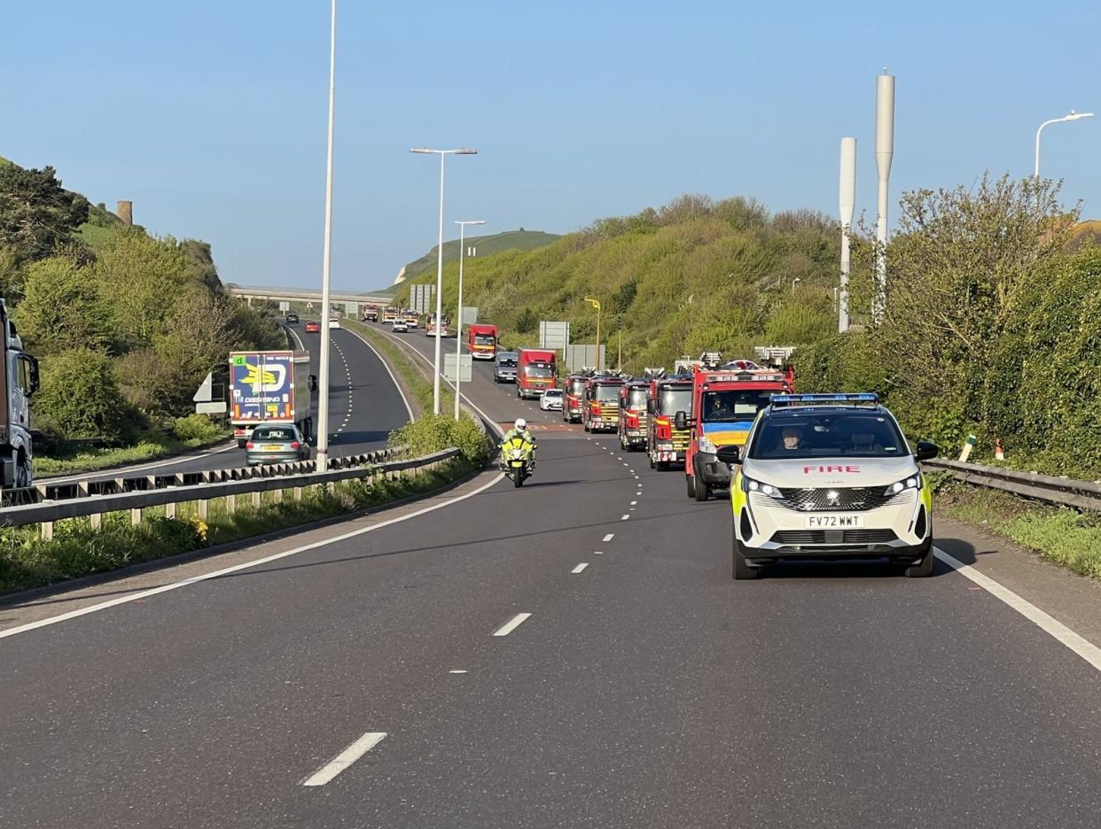 Ukraine convoy 1 - a convoy of fire and rescue service vehicles driving on the road