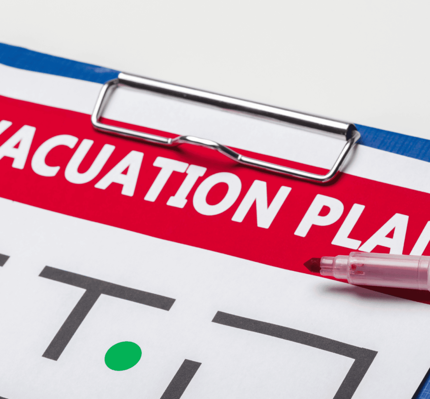 An example of an evacuation plan attached to a clipboard