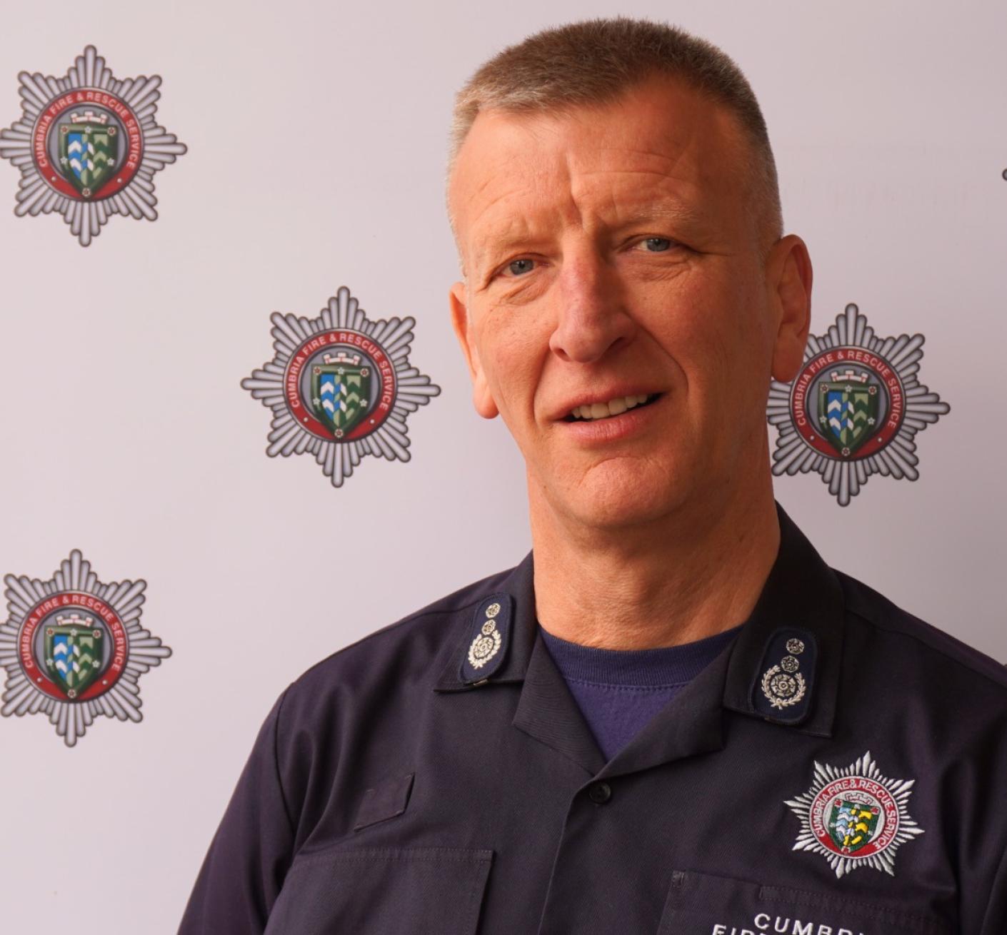 A portrait of a male firefighter