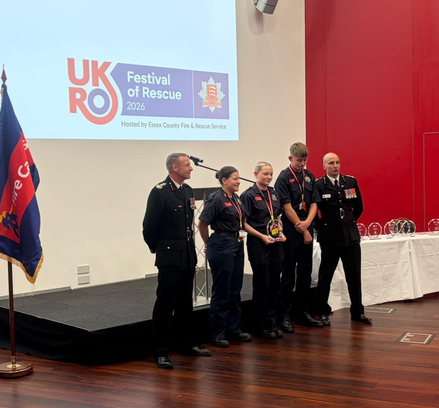 Cadets presented with a glass trophy at a national Fire Cadets challenge