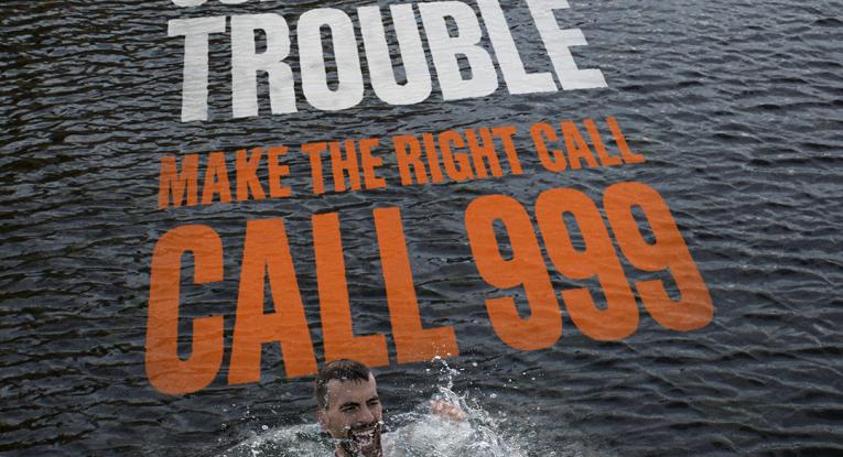 image reads: "If you see someone in trouble, make the right call, call 999."