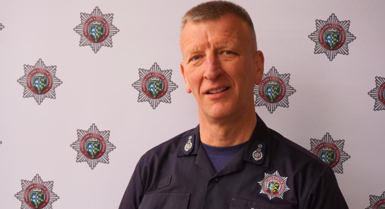 A portrait of a male firefighter