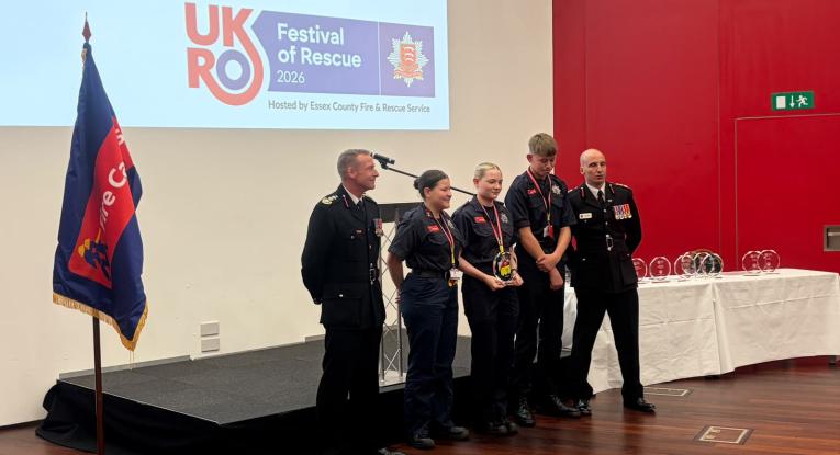 Cadets presented with a glass trophy at a national Fire Cadets challenge