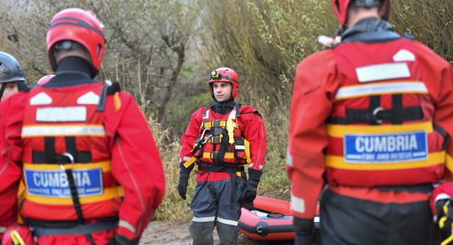 firefighters in water rescue PPE